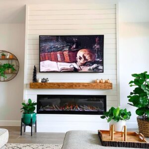 fireplace wall with TV and shiplap finish